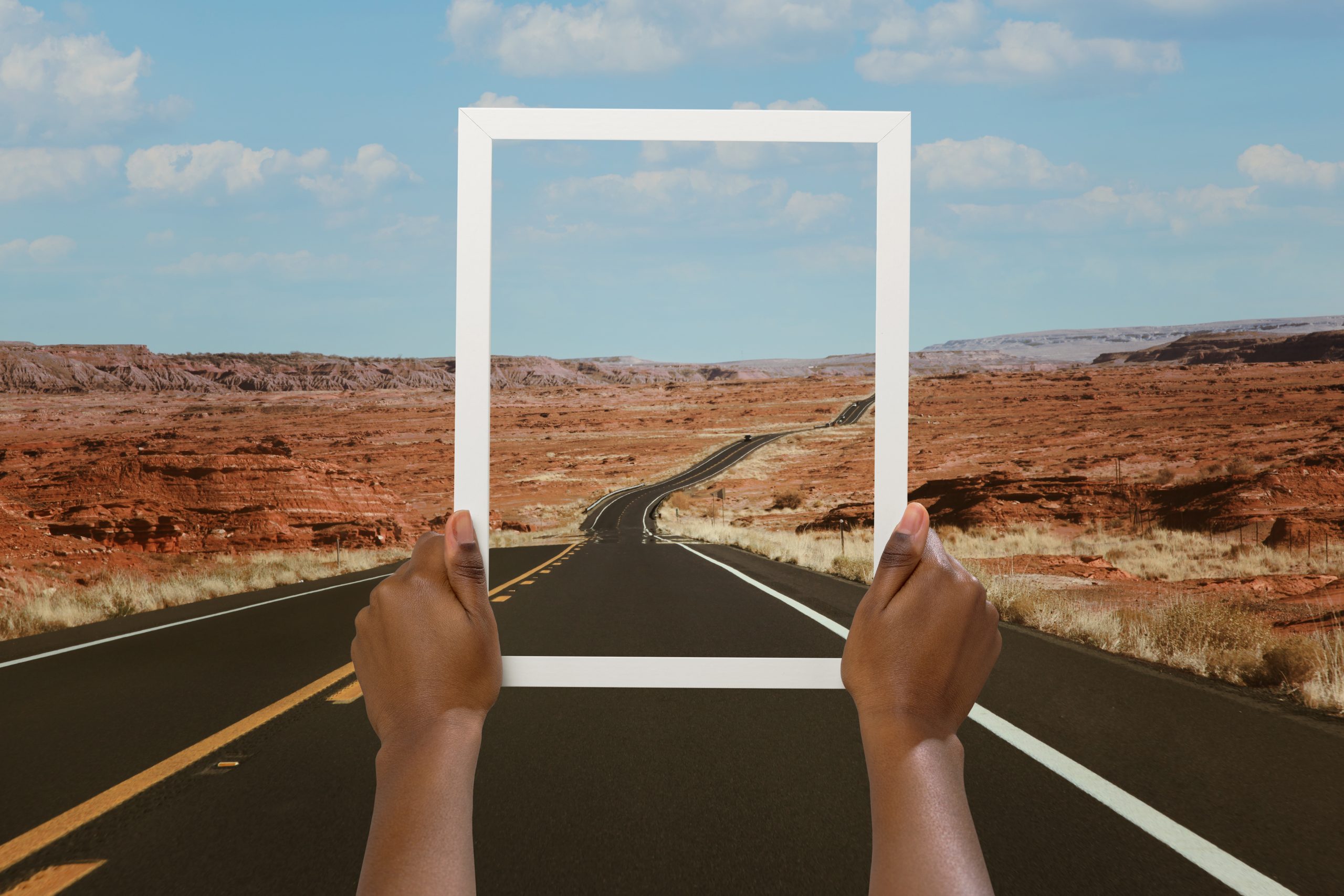 A scenic landscape captured within a photo frame.