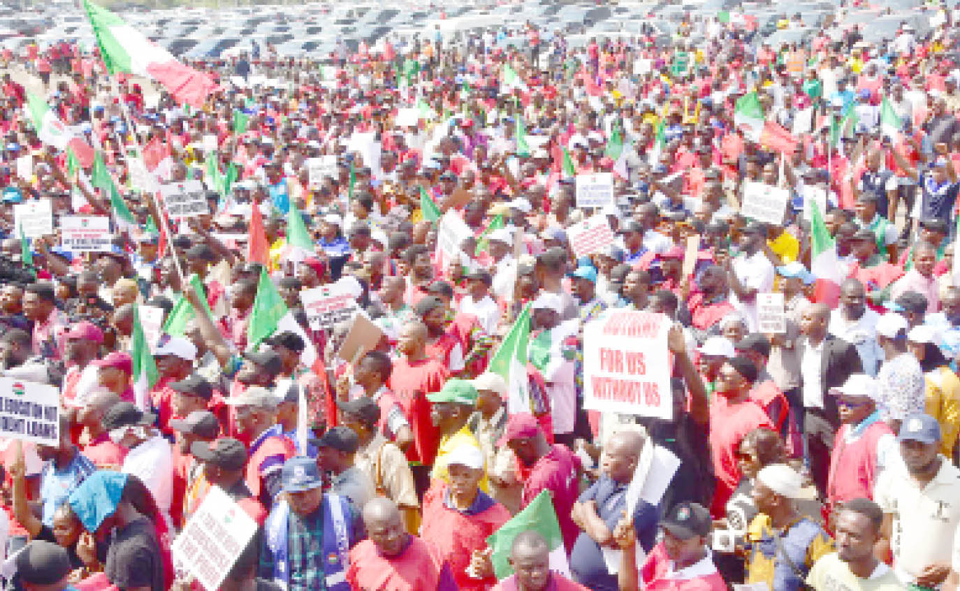 NLC members protesting against the cost of living crisis at the National Assembly Complex, Abuja