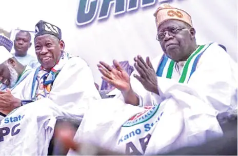Ganduje and President Tinubu engaging in a discussion.