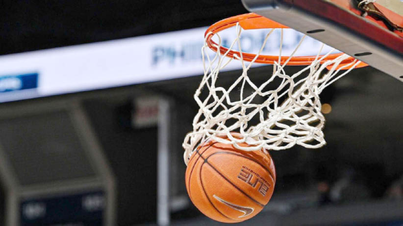 A basketball court showcasing a competitive game