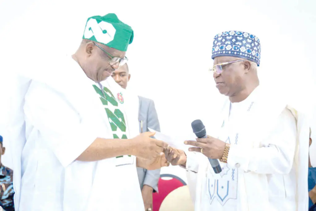 Governor Caleb Mutfwang receiving APC membership card