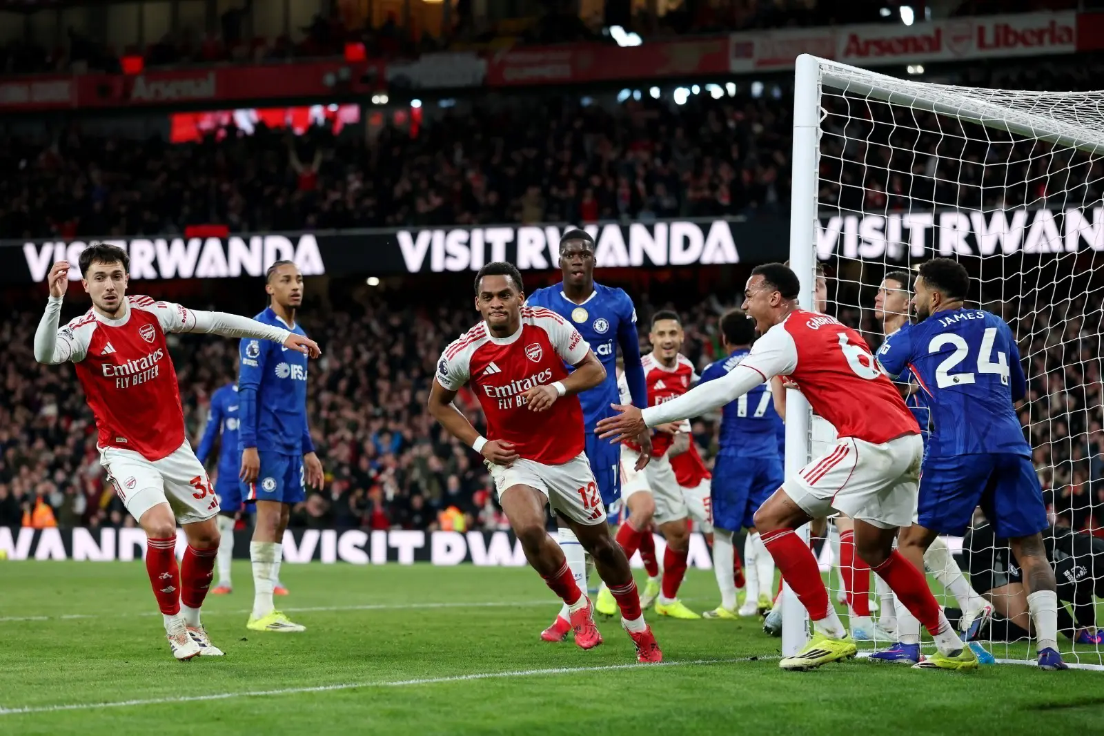 Arsenal players celebrating their victory over Chelsea at the Emirates Stadium.