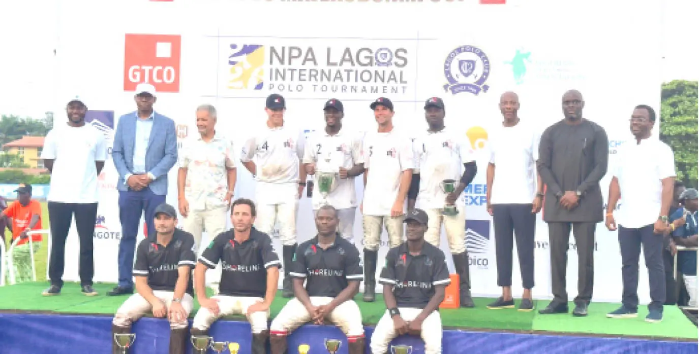 Players of Lagos STL team celebrating victory during the Lagos International Polo Tournament.