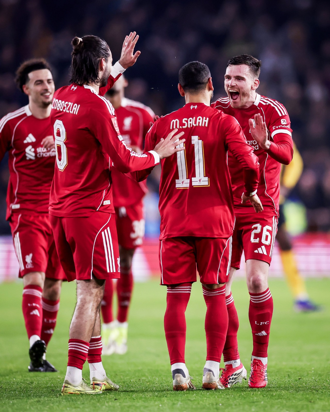 Liverpool team celebrating a goal during the FA Cup match against Wolves
