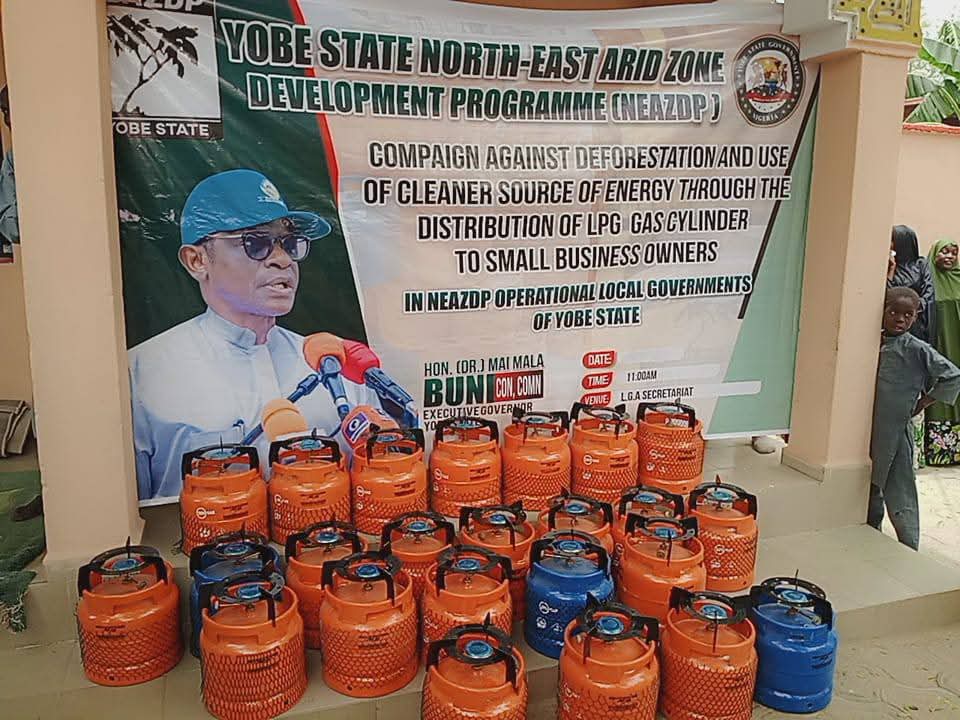 Women receiving gas cylinders as part of an environmental initiative in Yobe State.