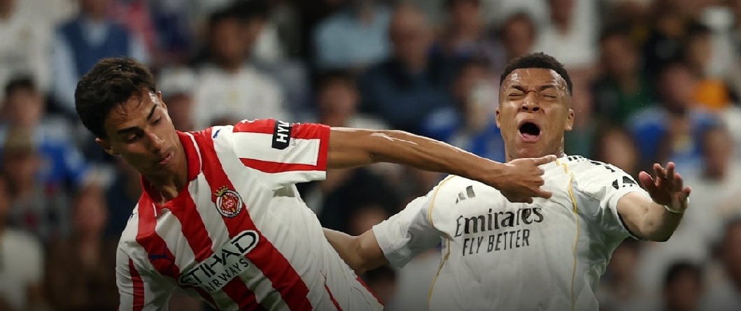Real Madrid players in action during a match against Girona.