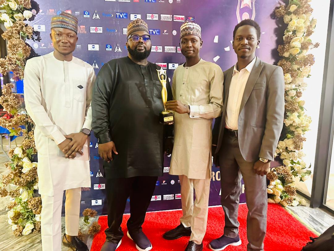 Trust TV staff celebrating an award