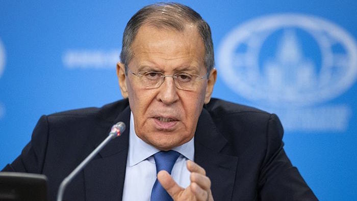 Russian Foreign Minister Sergei Lavrov gestures during a press conference.
