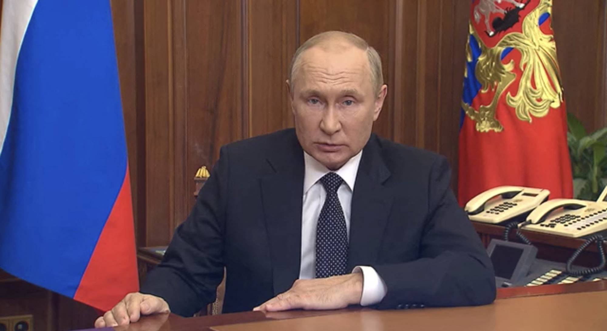 Russian President Vladimir Putin addressing the nation regarding military conflicts in Ukraine.