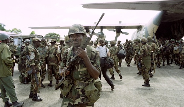 Nigerian Air Force cargo plane transporting troops and supplies during peacekeeping operations