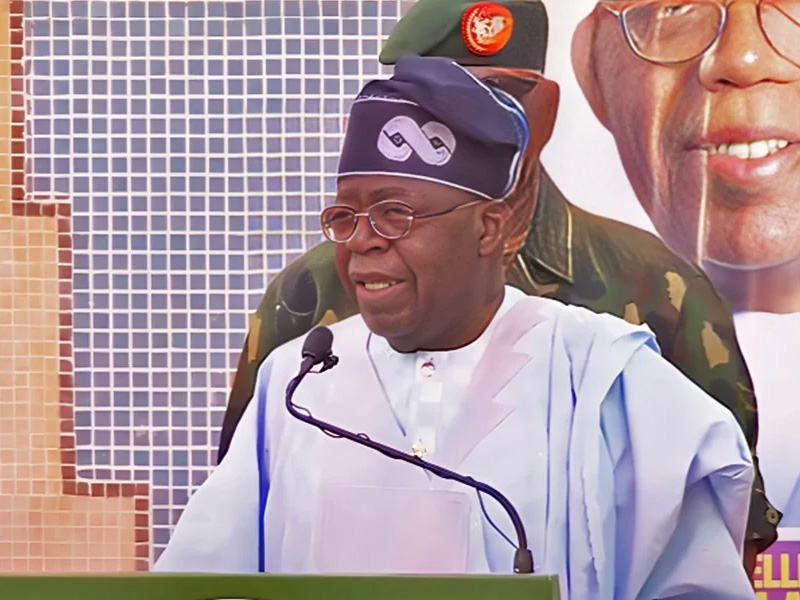 President Bola Tinubu addressing a gathering about youth skills development.