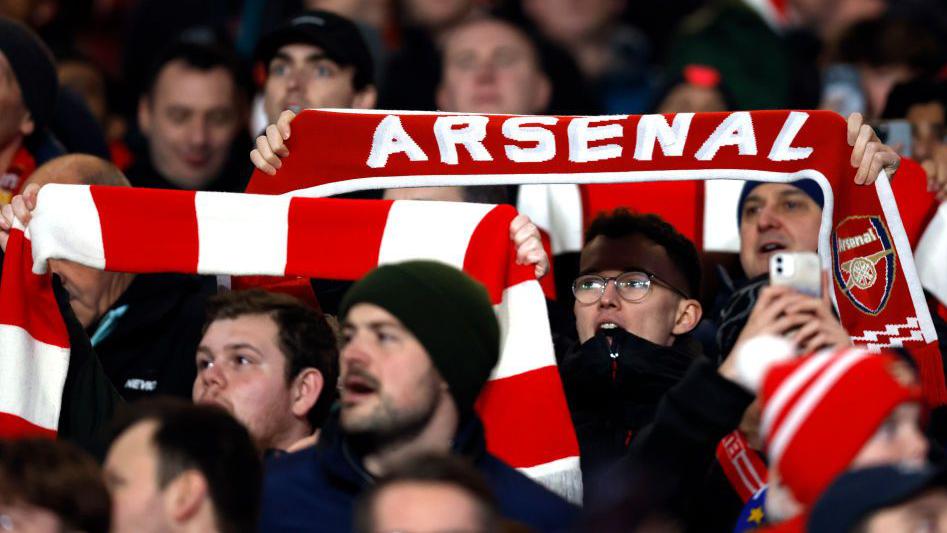 Arsenal fans expressing their views on ticket price hike