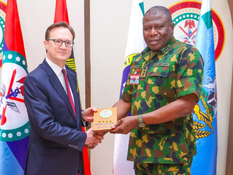 Chief of Defence Staff Olufemi Oluyede and UK High Commissioner Richard Montgomery during a meeting at the Defence Headquarters.