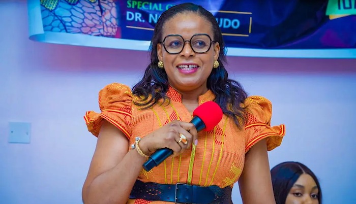 Dr. Nonye Soludo speaking at an event for International Women's Day