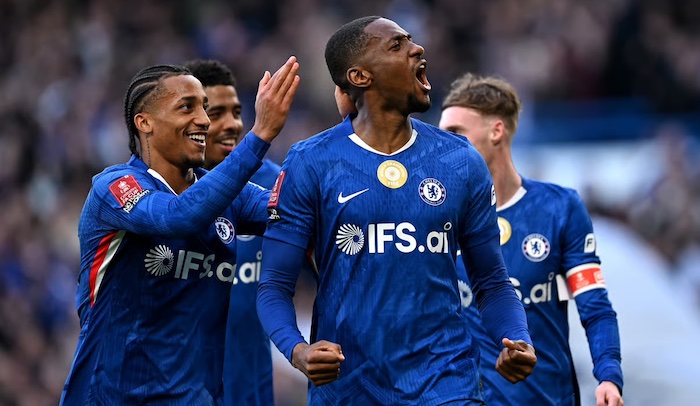 Chelsea players celebrate a goal during their FA Cup match against Port Vale.
