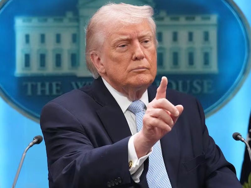 Donald Trump speaking at an event.