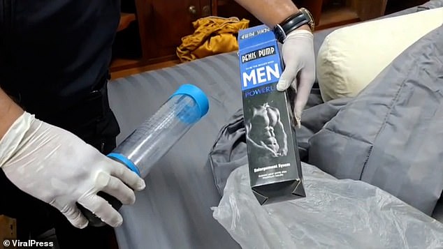 Items recovered during the police raid including cash and a handgun