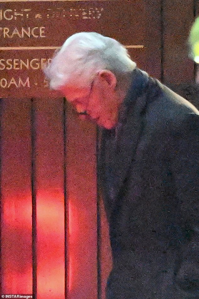 Bill Clinton seen looking down during his walk through NYC.