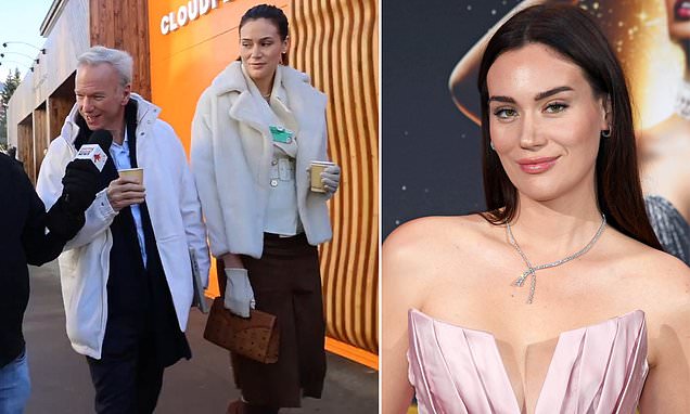 Eric Schmidt, 70, with Gloria-Sophie Burkandt at the World Economic Forum in Davos