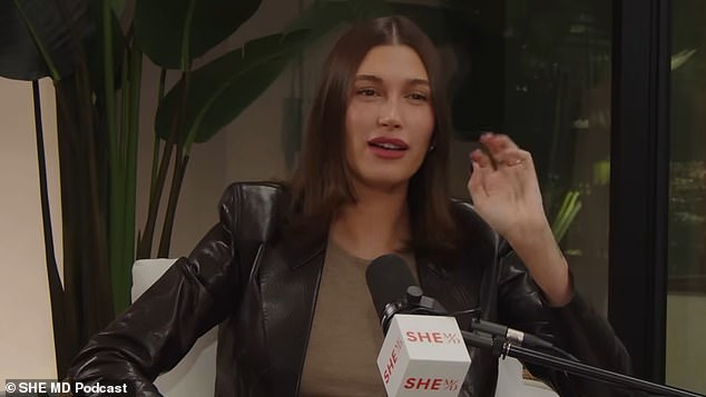 Hailey Bieber posing for a photo.