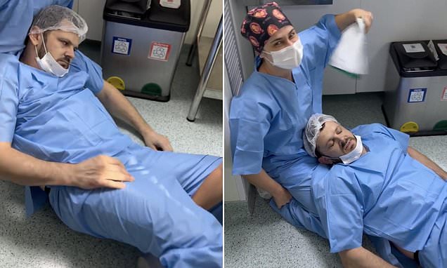 A father is seen collapsing in a hospital delivery room.