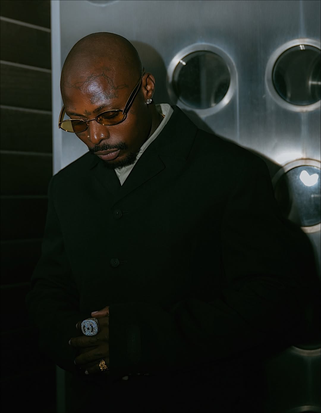 Asake pictured in a vibrant, stylized image, likely promoting his upcoming album.