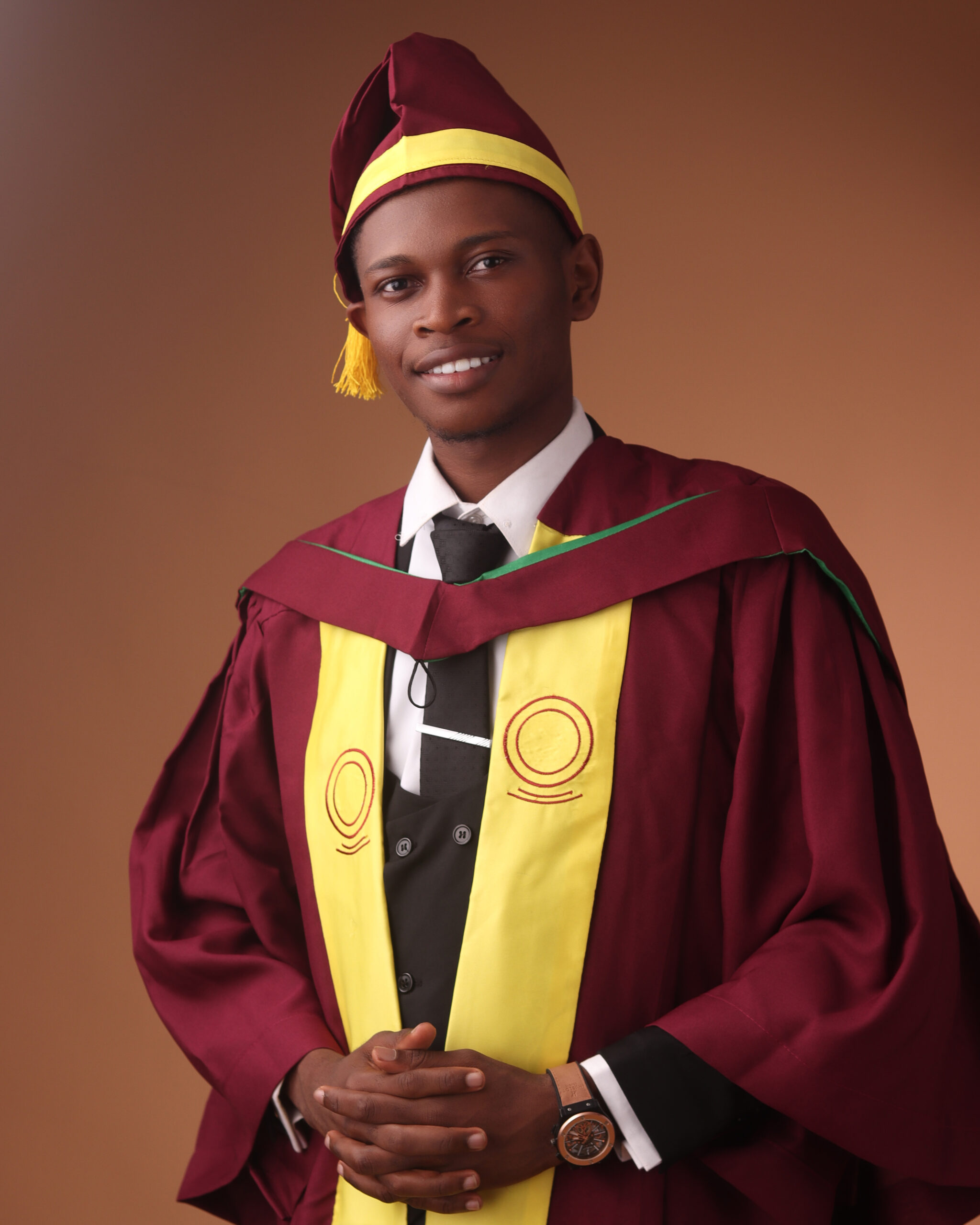 Benedict Umeozor in academic regalia at the University of Lagos convocation.