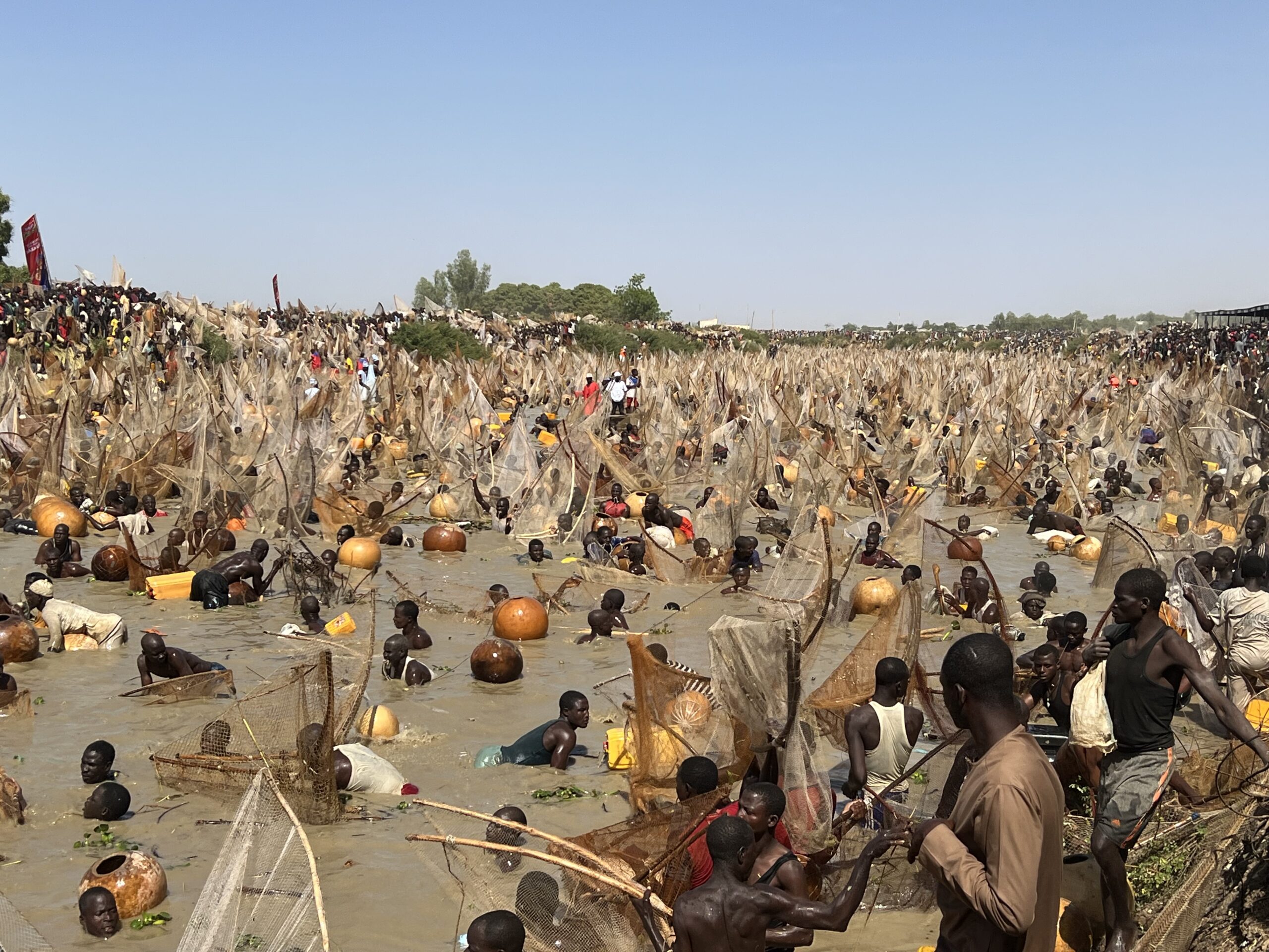 Participants actively engaged in the Argungu Festival