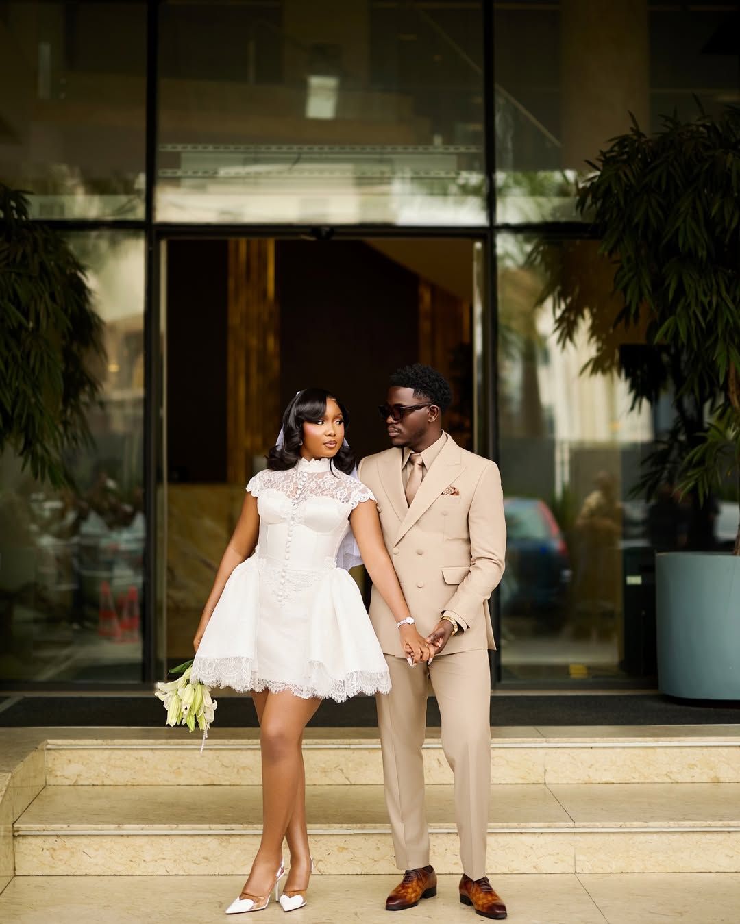 Simi Sanya and Femi Dapson in their wedding attire