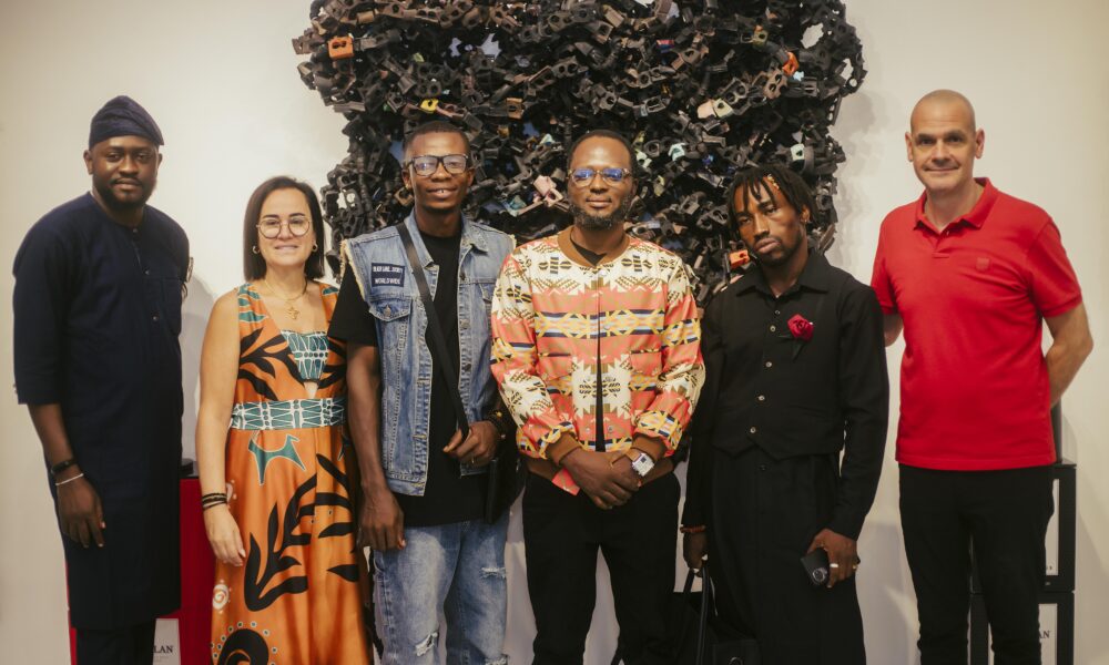 Artists and organizers at the Recycling Matters II Exhibition celebrating the collaboration.