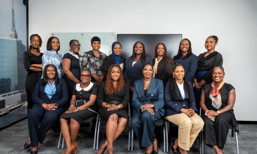 Women collaborating in a digital payments strategy meeting