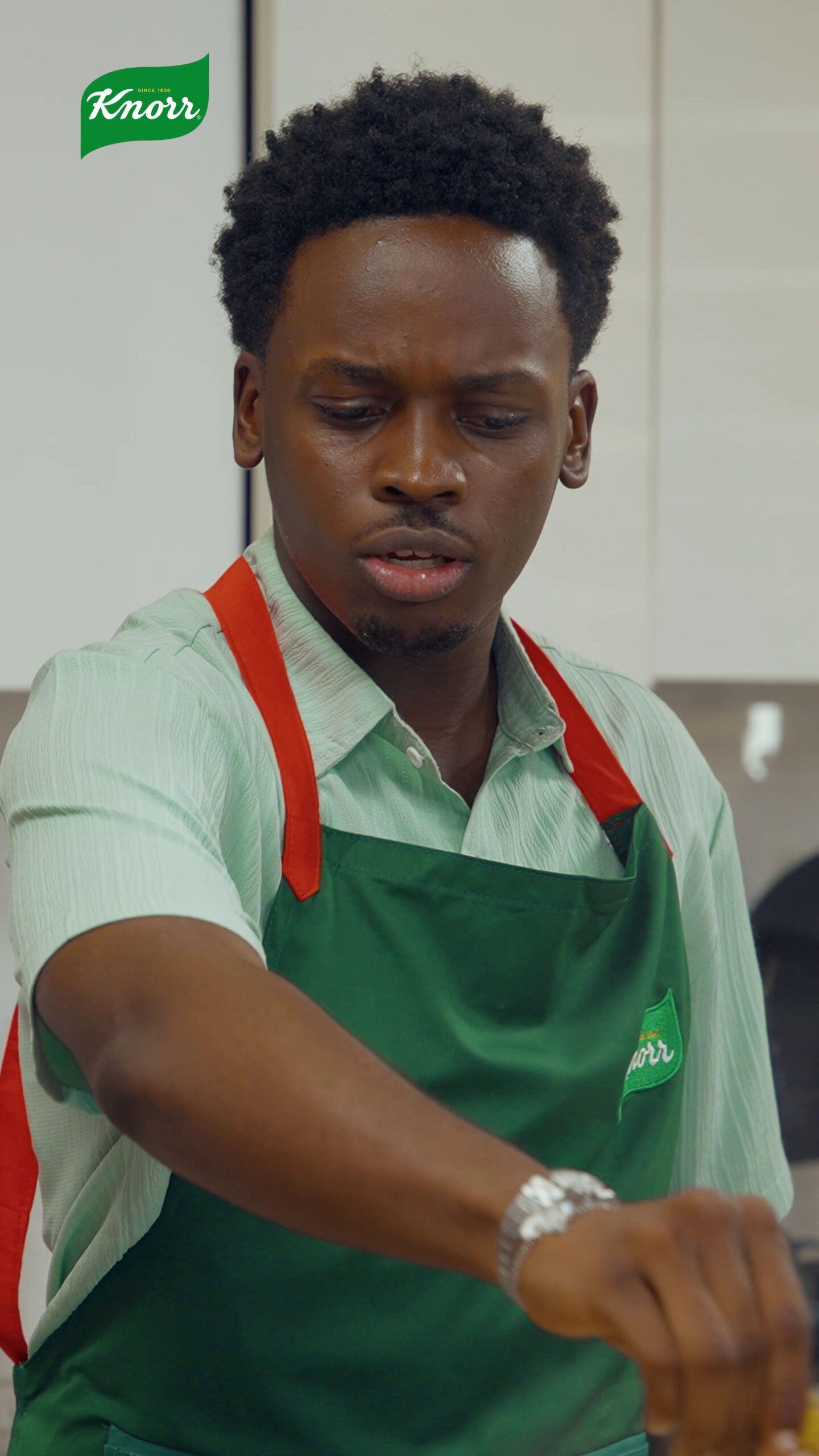 Participant showcasing their cooking skills during a Knorr-sponsored dating event.