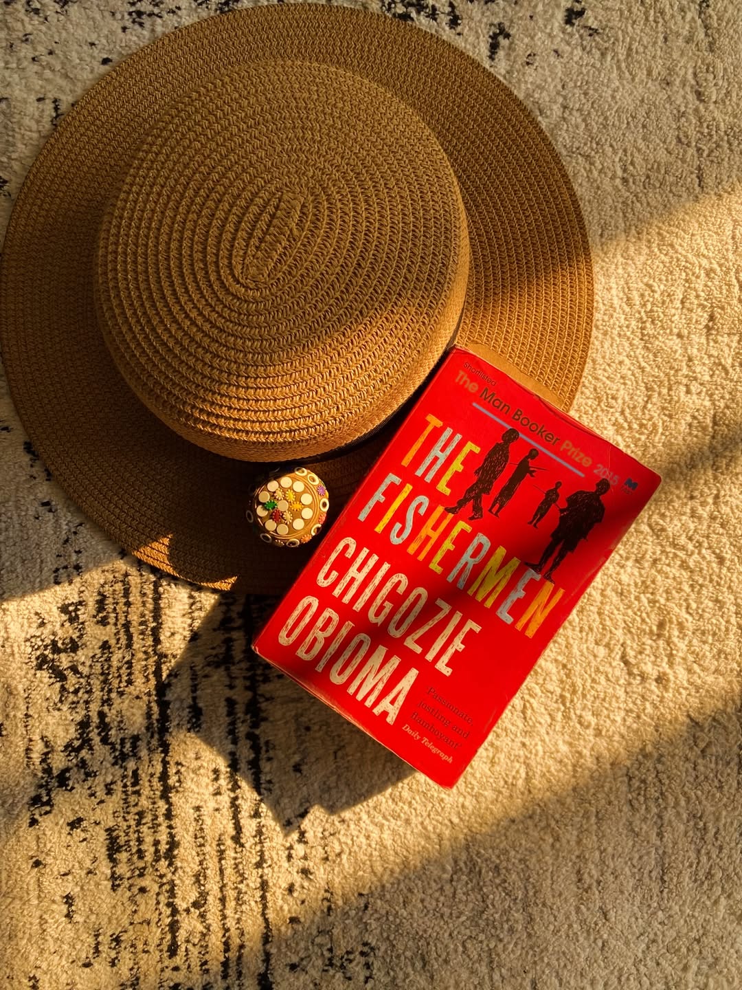 Illustration related to the book 'The Fishermen', depicting laughter by a river.