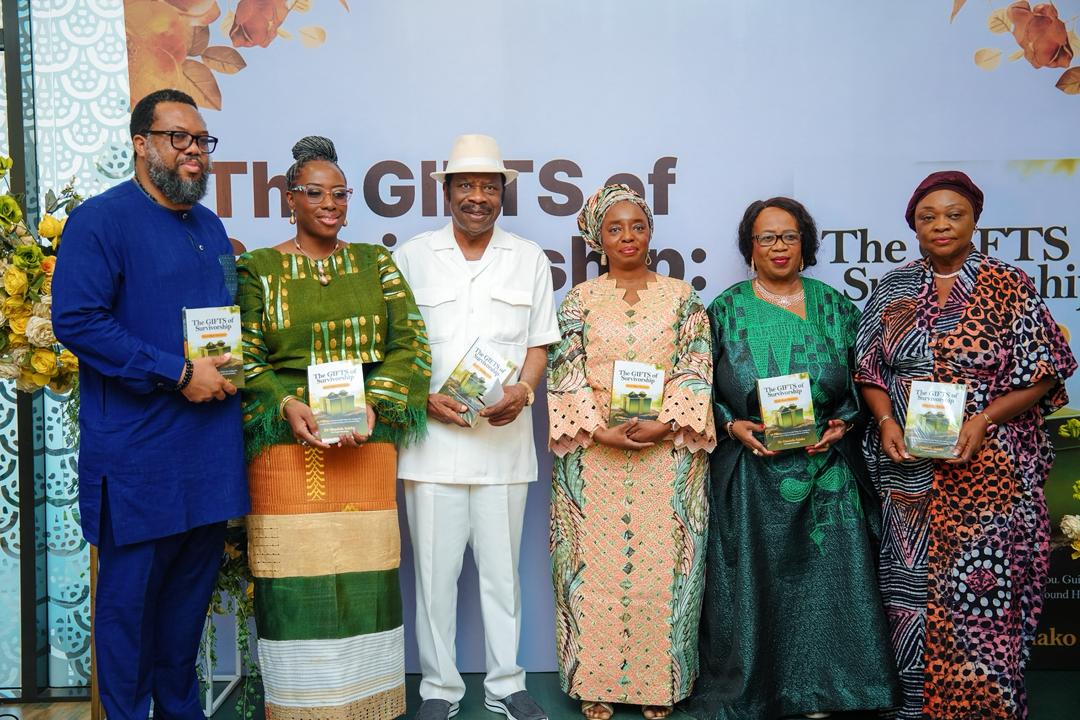 Dr. Omolola Salako, surrounded by dignitaries including the First Lady of Lagos State, at the launch of her book 'The GIFTS of Survivorship'.
