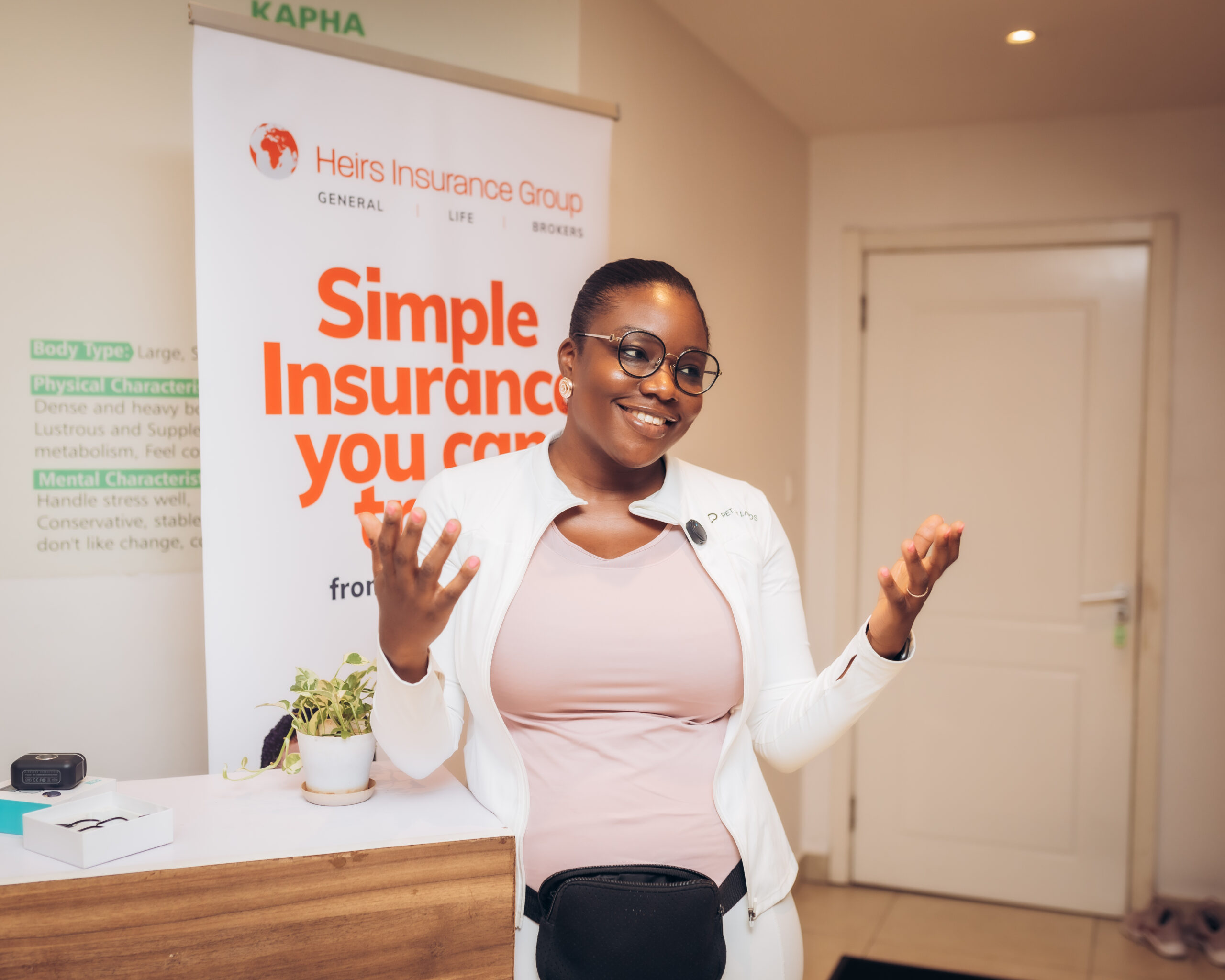 Attendees participating in a yoga session at the event.