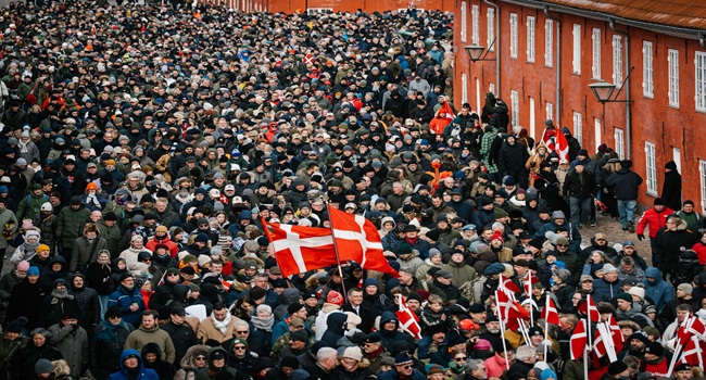 Danish veterans and supporters participating in a silent march towards the US embassy in Copenhagen.