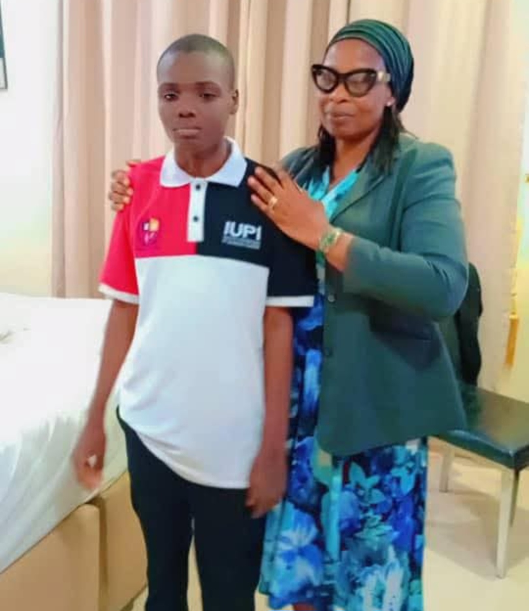 Pastor Chibuzor with his adopted son Aboy after marriage