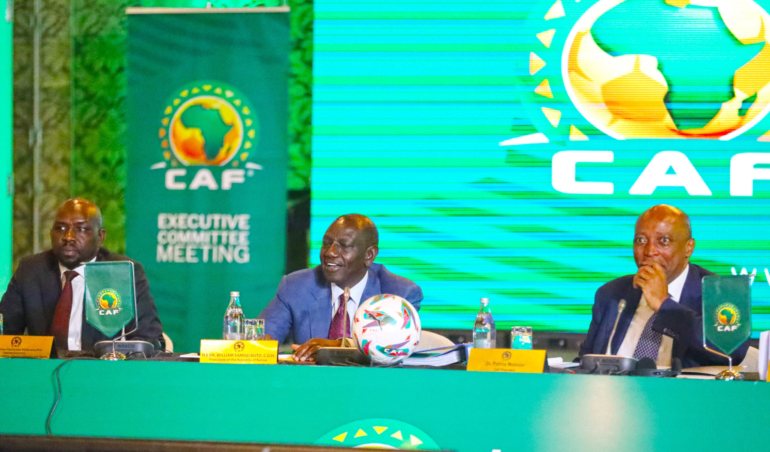 Kenya's government official holds a press conference discussing the payment to CAF for hosting AFCON 2027.