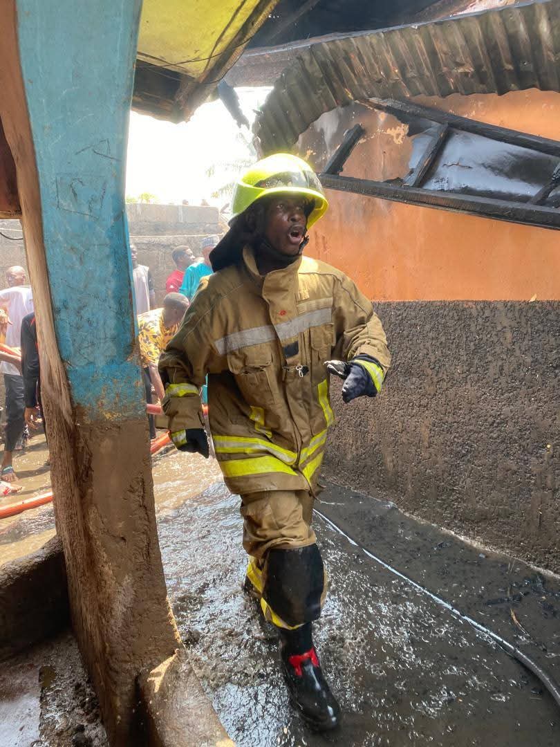 Firefighters at the scene of the fire in Taraba