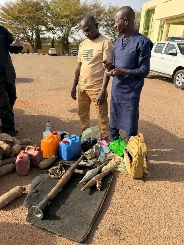 DSS operatives display the recovered arms during the operation in Gombe.
