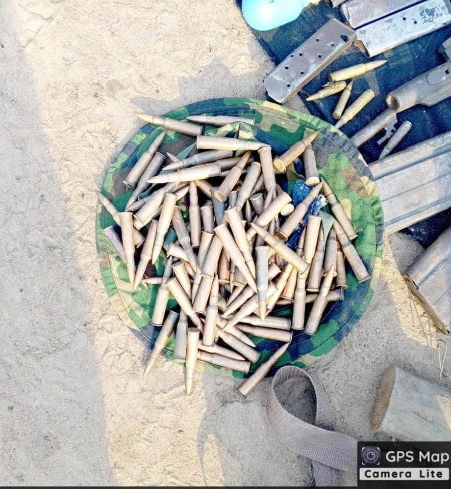 Captured weapons and ammunition from the operation.