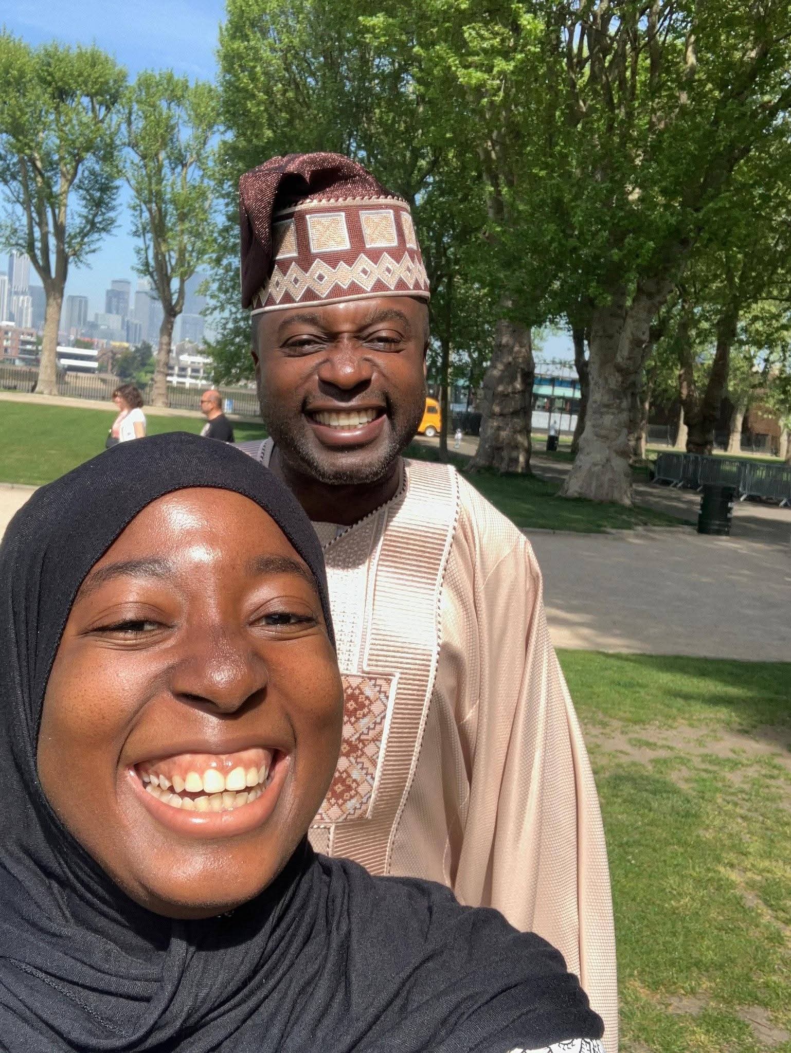 Celebratory moment of a Nigerian family after a successful milestone.