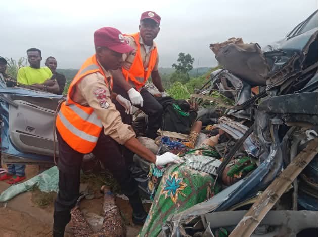 Scene of the accident involving a commercial bus and a stationary truck in Ogun State