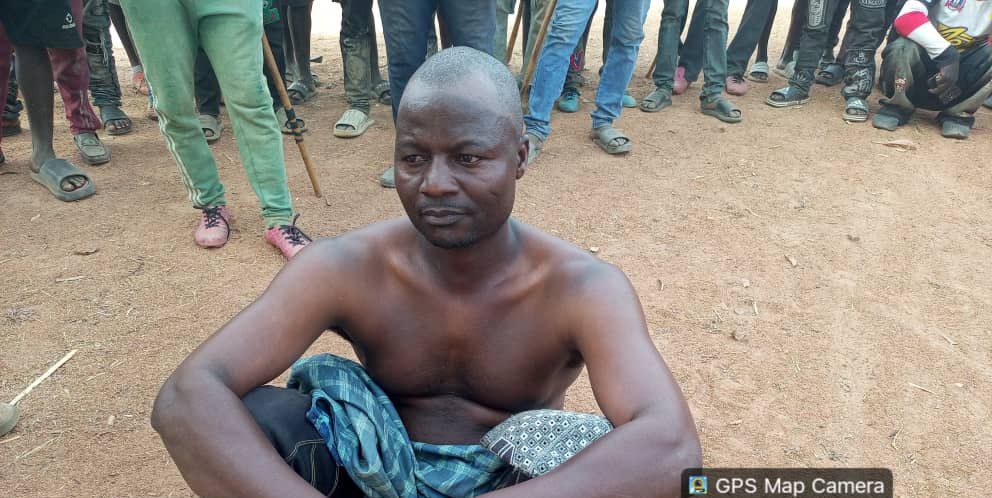 Troops capturing a notorious criminal in Jos