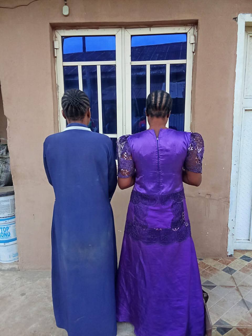 Baby being held by an adult