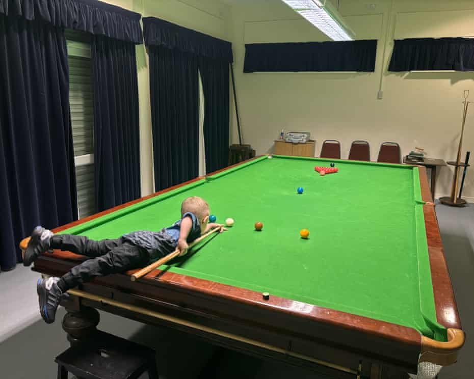Two-year-old Jude Owens performing a trick shot in snooker, setting two Guinness World Records