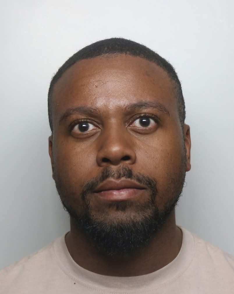 Illustration representing a man being jailed or a surveillance camera.