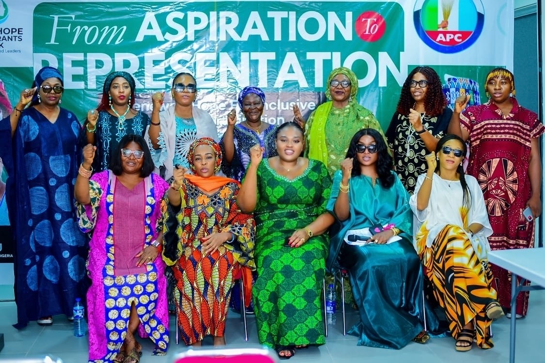 Participants at the RHFAN press briefing advocating for women's representation in politics.
