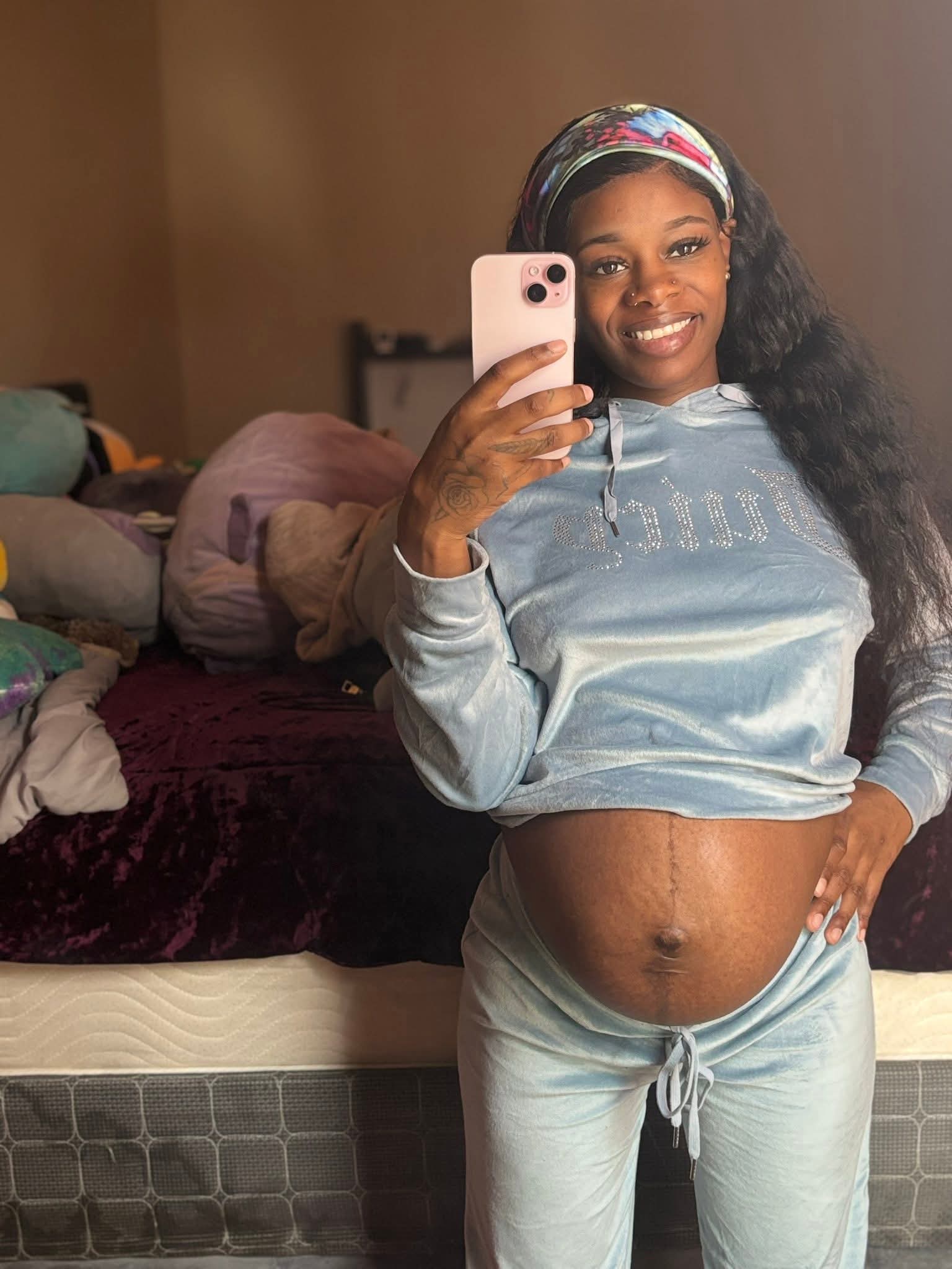 Shamica Mariee, the mother expressing her feelings about her newborn