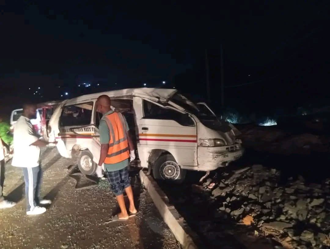 Scene of the accident at Agulu Lake, showing vehicles involved and responders at work.